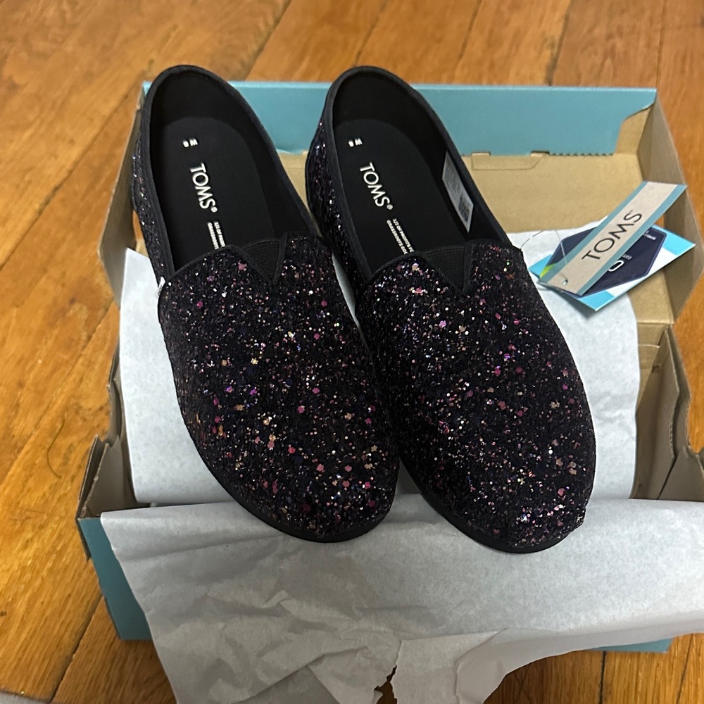 TOMS Black and Pink Glitter Slip-Ons